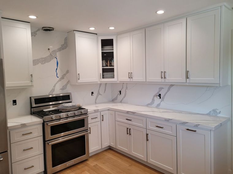 Before and after: Elevate your space with JV Cabinets' custom kitchen transformations.